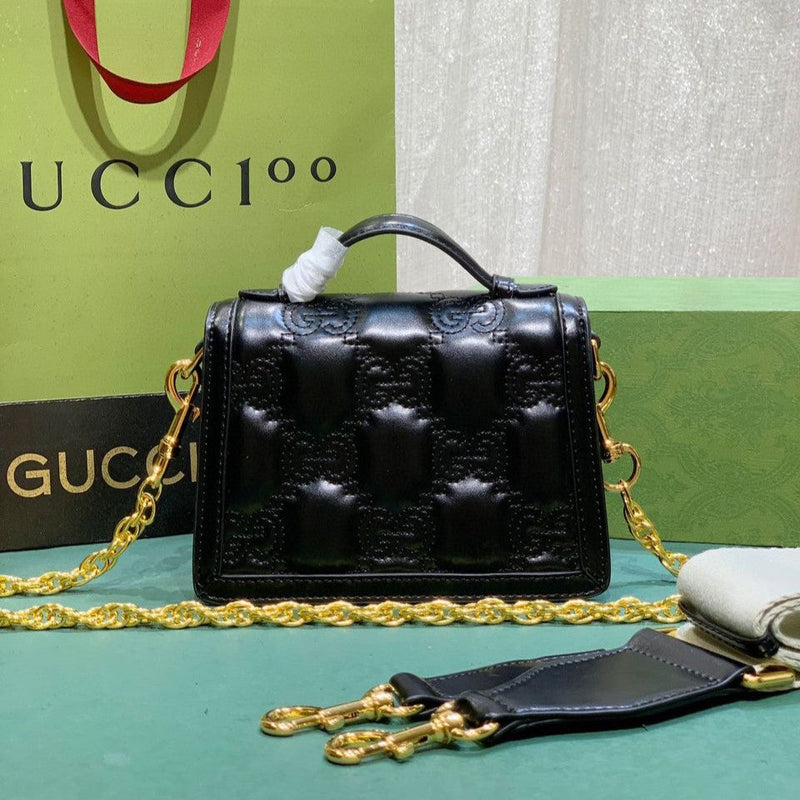 Bolsa Modelo Gucci tiracolo de couro com GG