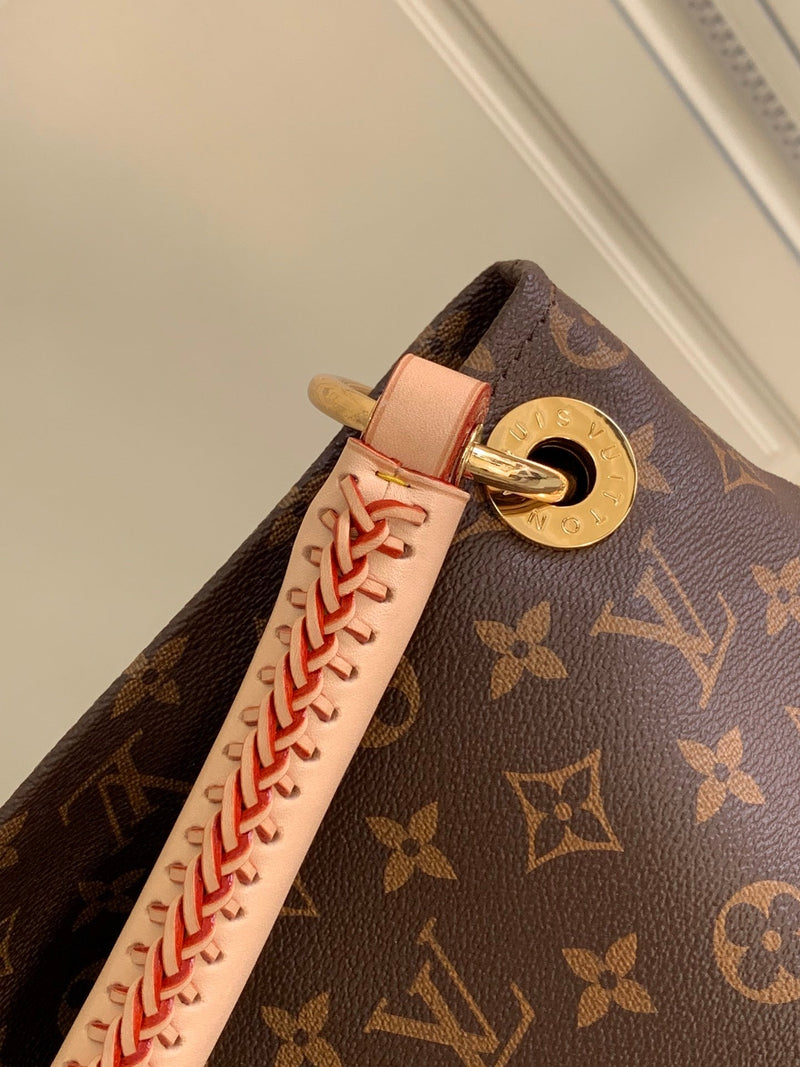 Bolsa Louis Vuitton Artsy Monograma MM