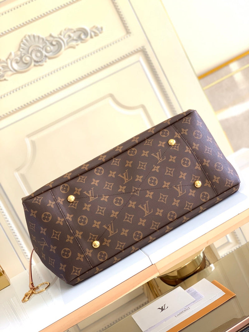 Bolsa Louis Vuitton Artsy Monograma MM