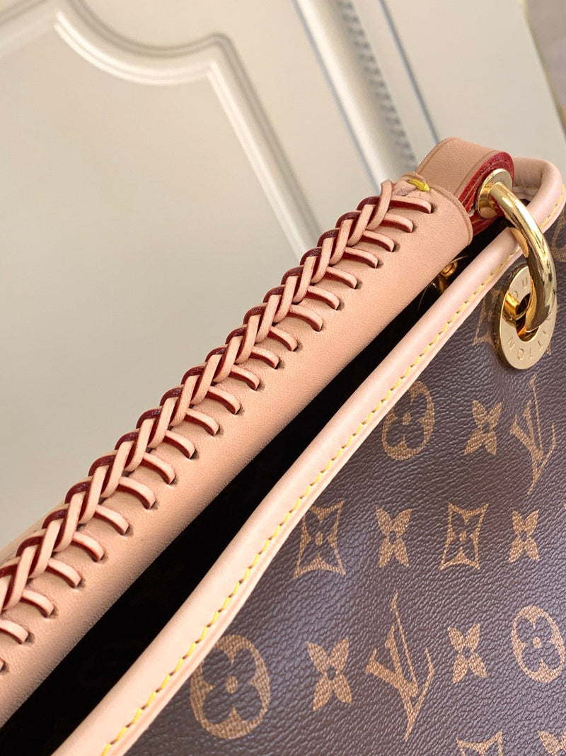 Bolsa Louis Vuitton Artsy Monograma MM