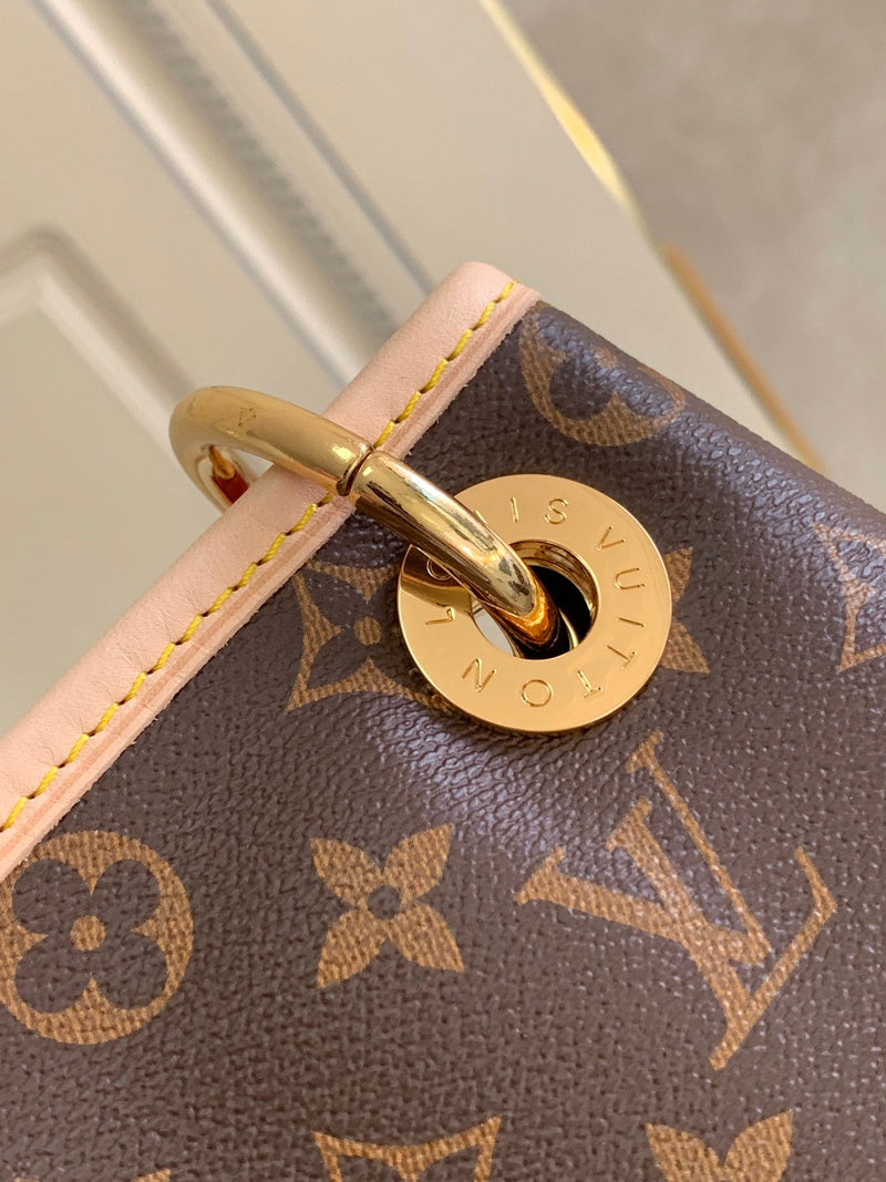 Bolsa Louis Vuitton Artsy Monograma MM