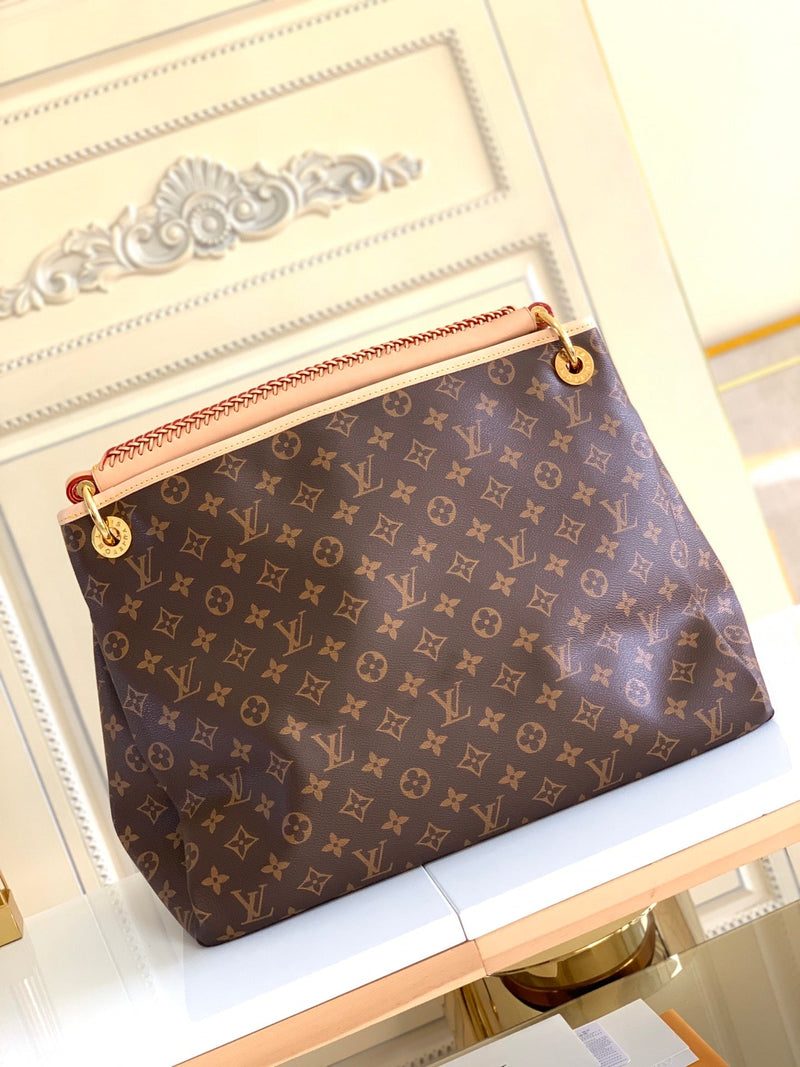 Bolsa Louis Vuitton Artsy Monograma MM