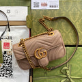 Gucci Bolsa GG Marmont Matelassê Média